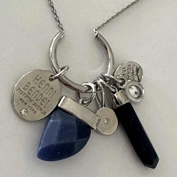 Henri Bendel  silver tone necklace with dark blue crystal and logo charms disc - Picture 2 of 9